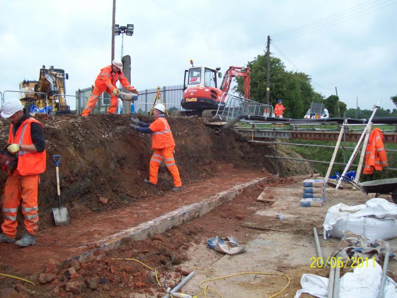 Abutment cut down to level - screed being prepared.