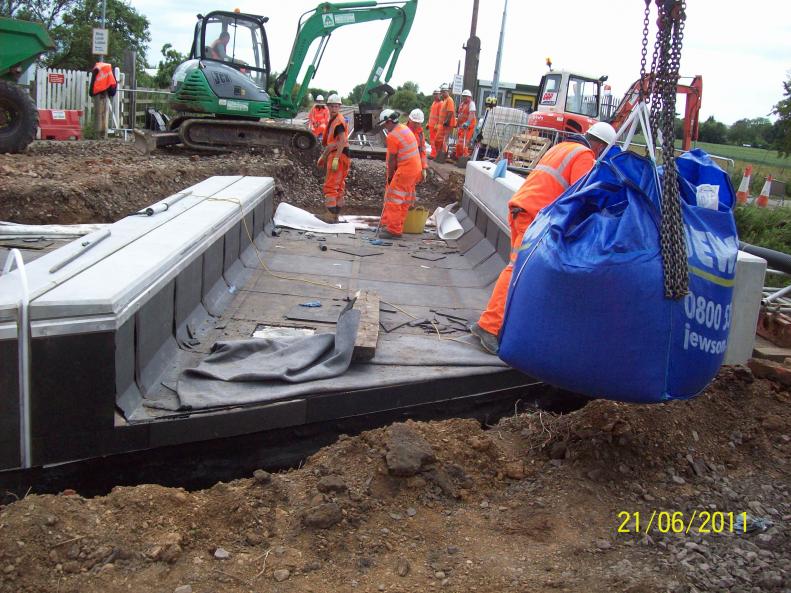 Waterproofing being Placed to the deck - Backfill about to start using the bulk bags.