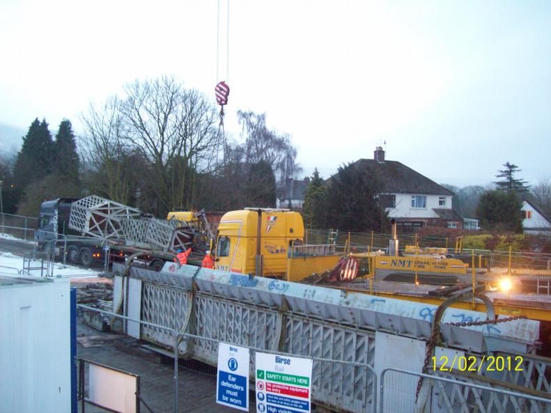 Existing bridge being cut up and loaded away 