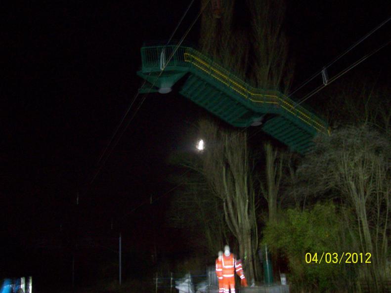 North Staircase being lifted in to place between the trees and ohle