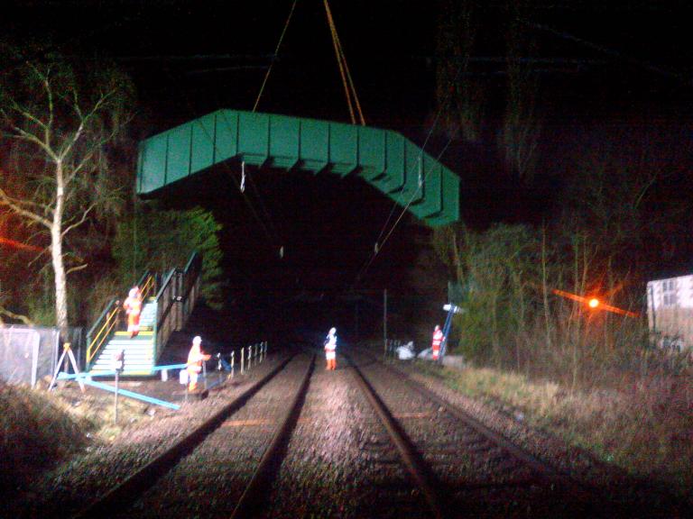 New structure being lifted into place.