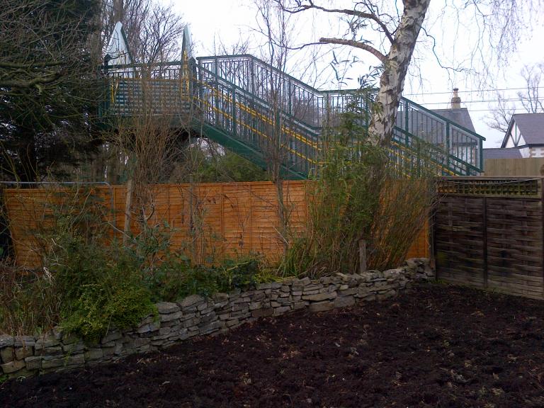 View on the new bridge from garden - note new fences