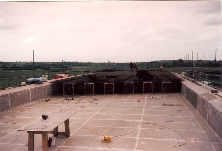 Steel being fixed to the bridge deck- Note the bearings top plate