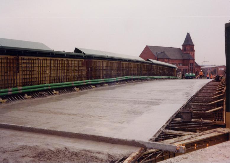 Concrete being levelled on the North deck