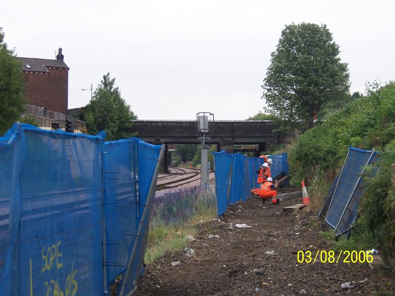 ASTE rail installing cable trough route on the South Abutment