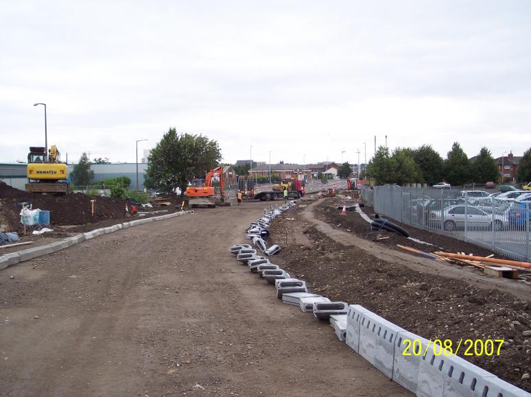 Kerbs being installed on the approach to the bridge