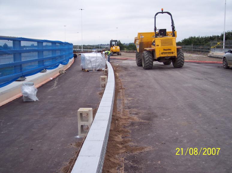 Kerbs being laid on the deck